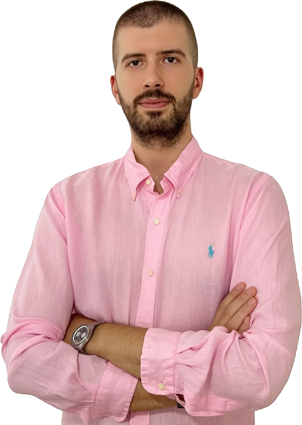 Kenan Kovačević, arms crossed, in a pink linen shirt